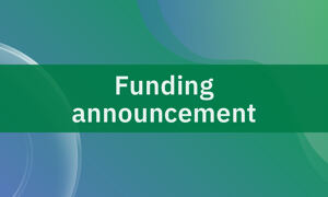 Text saying Funding announcement on green background.